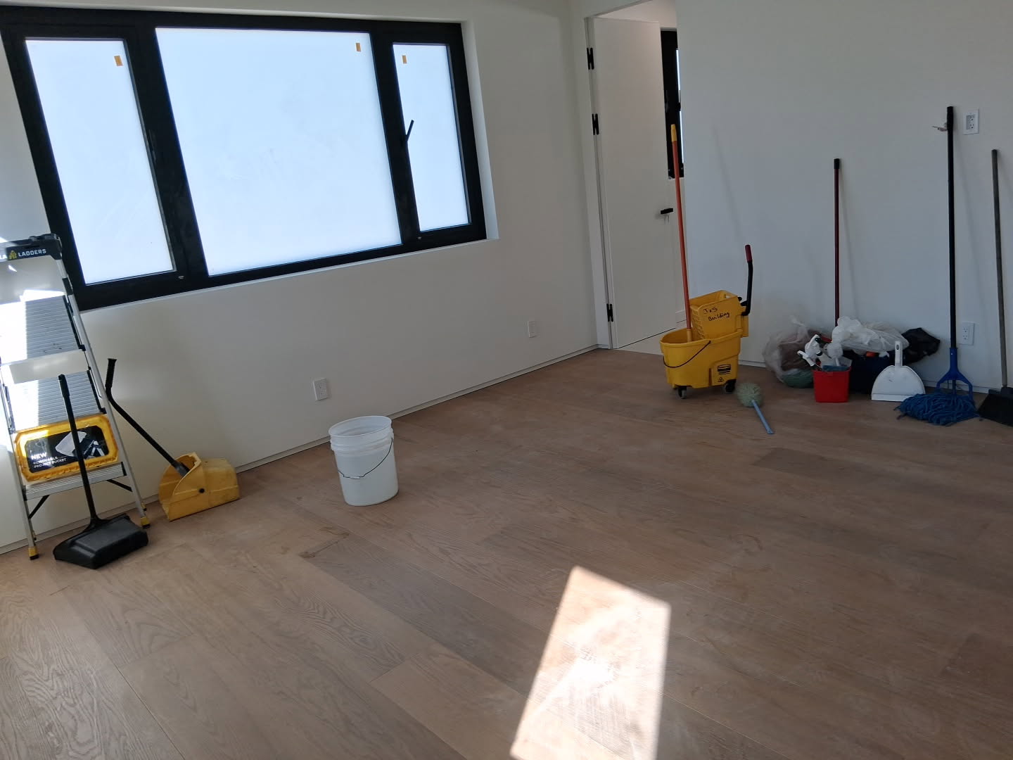 Detail-oriented cleaning, like scrubbing tile grout, is a key factor in post-construction cleaning costs in Los Angeles.