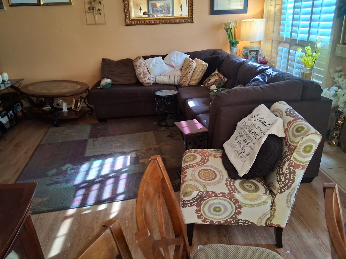 Before deep cleaning service in Los Angeles showing dusty living room